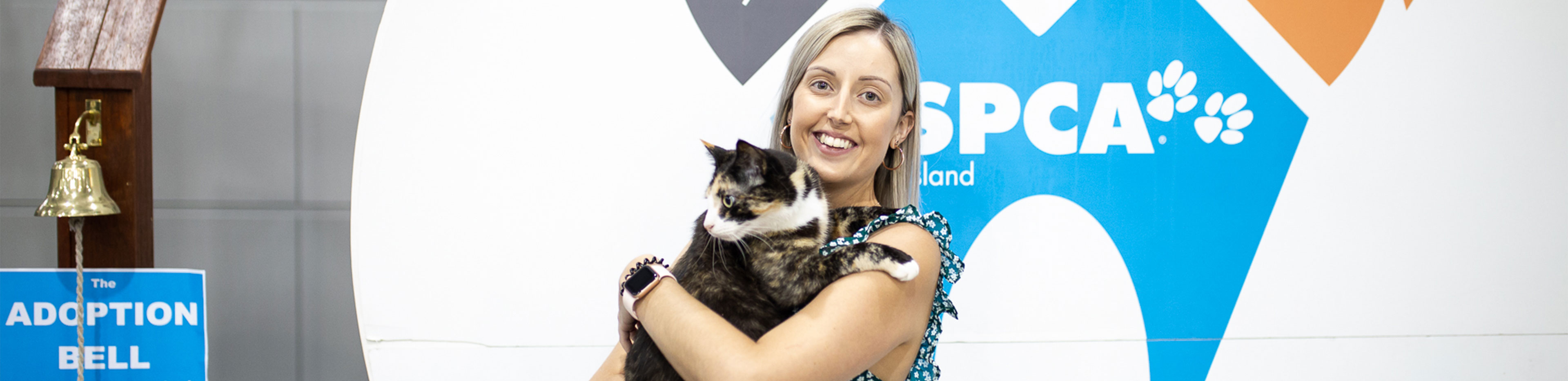 New owner and their cat at Pop Up Adoption event